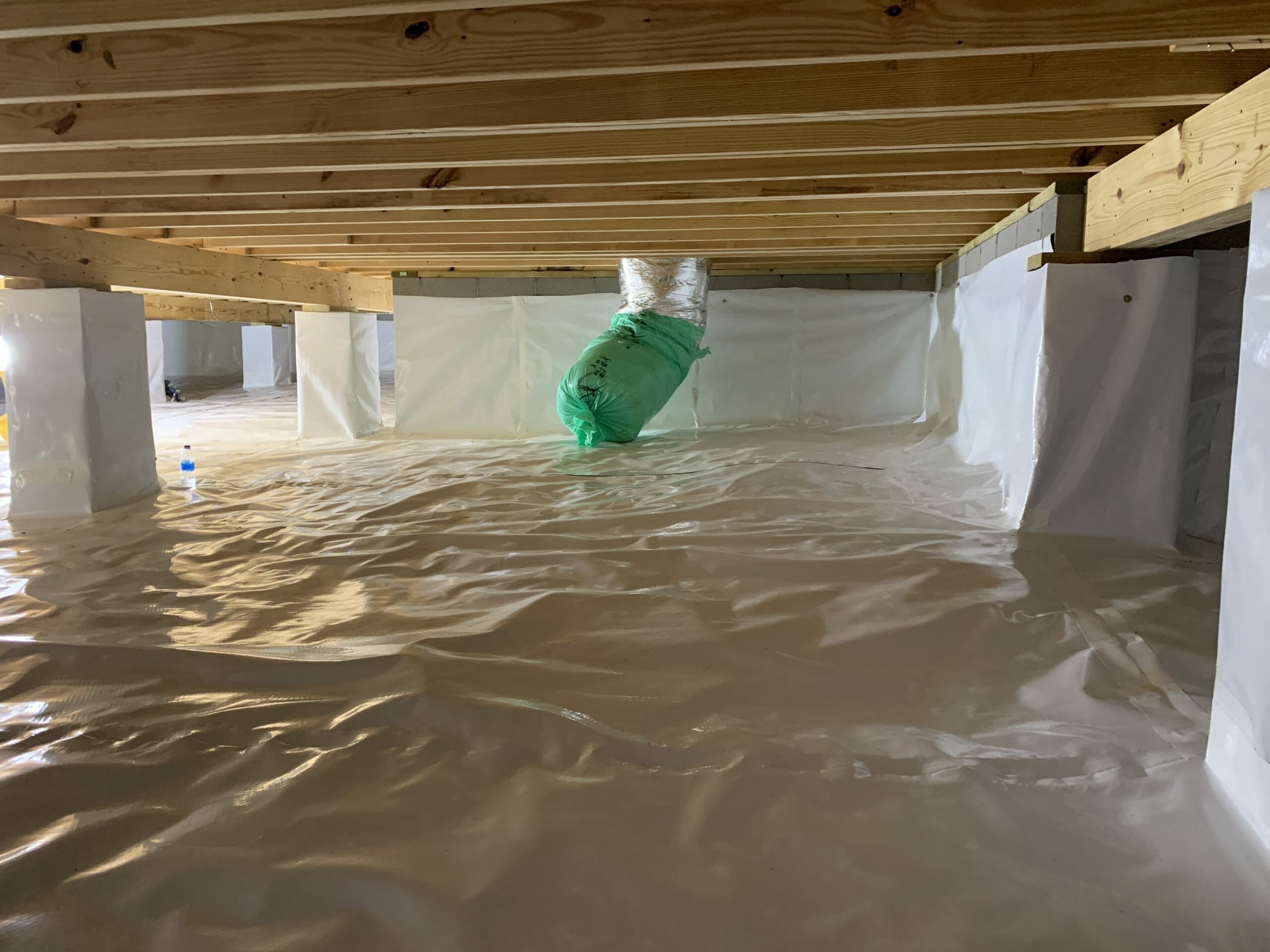 Crawlspace Encapsulation with Covered Vent in Holly Springs NC